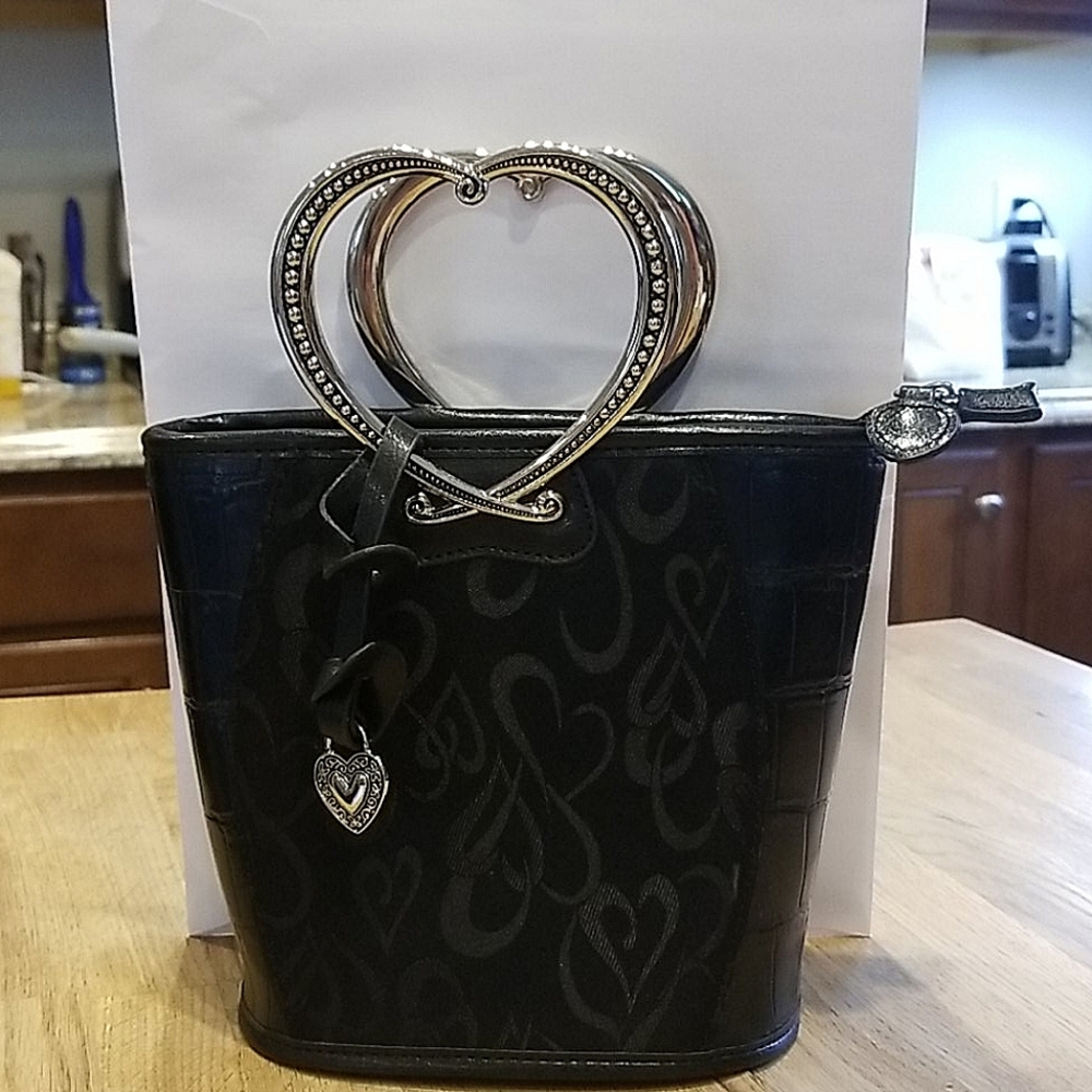 Black purse with heart handles